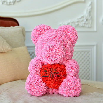 Розовый мишка из роз с красным сердцем 1.600 руб.